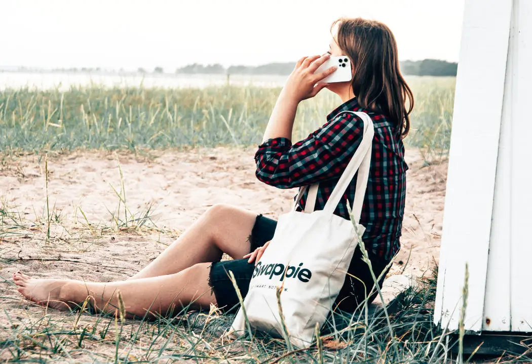 woman with printed tote bag