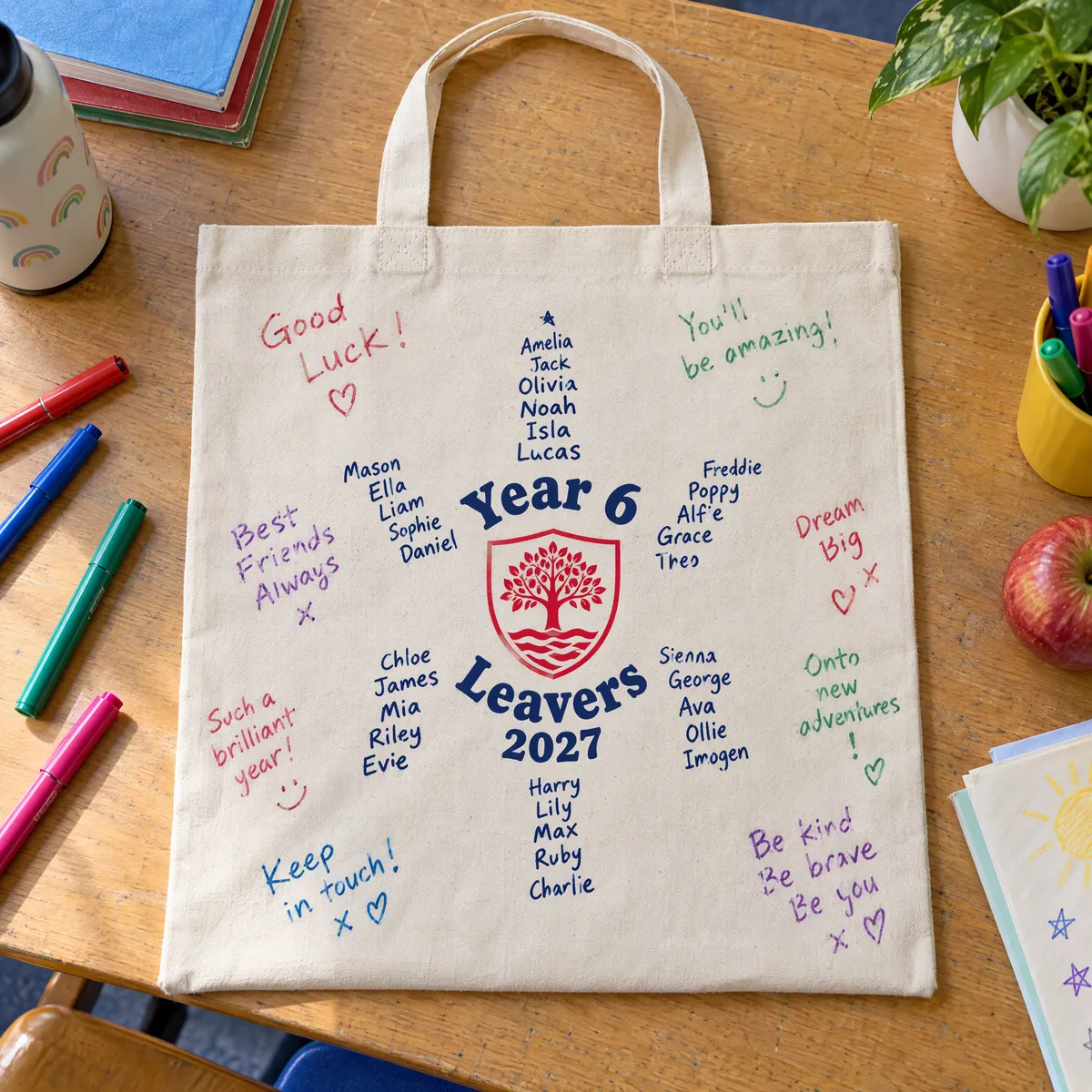 Natural cotton leavers' bag printed with the whole year group's names in a star, covered in signed messages